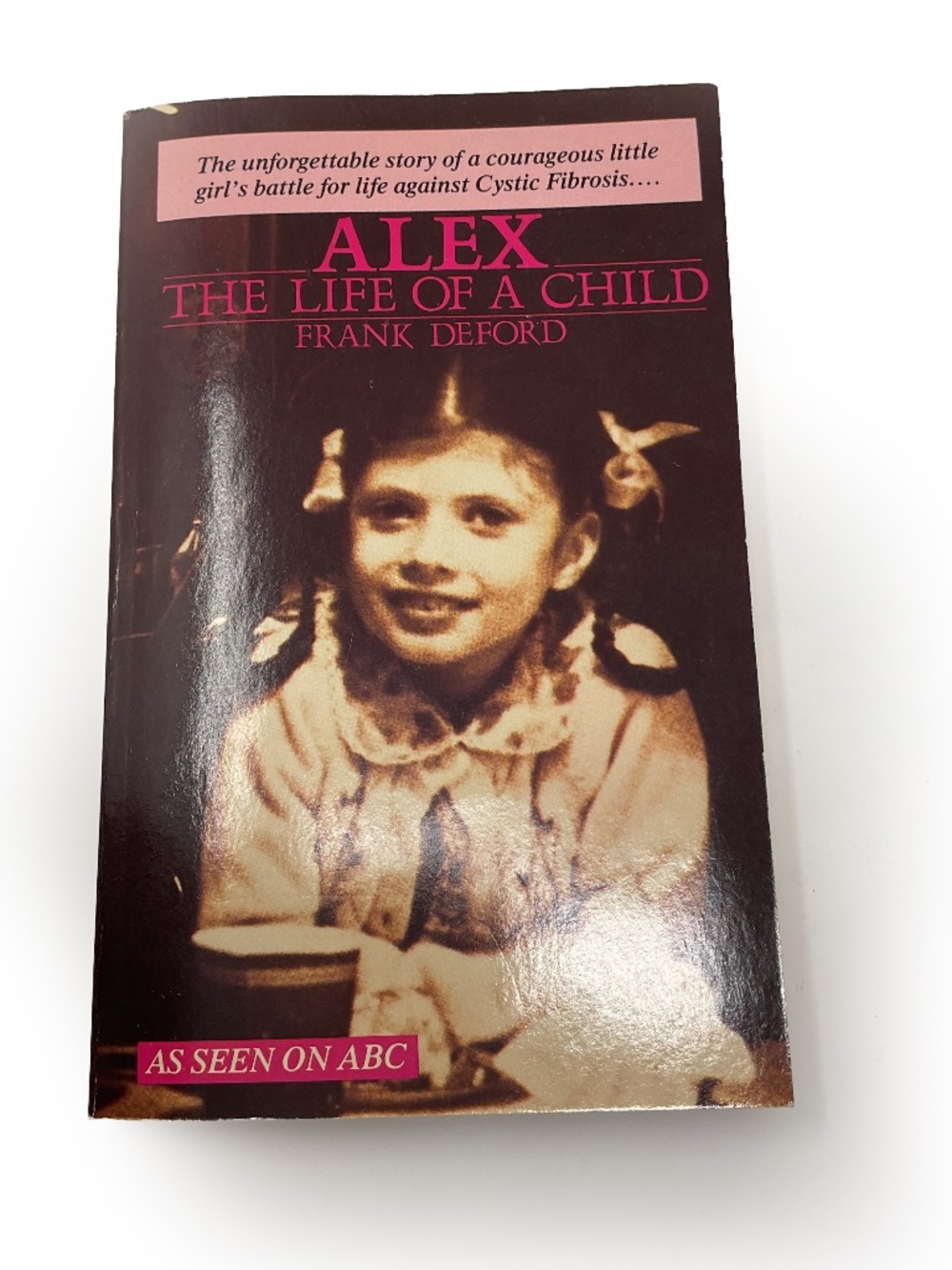 vintage paperback copy of the memoir Alex: The Life of a Child by Frank Deford
